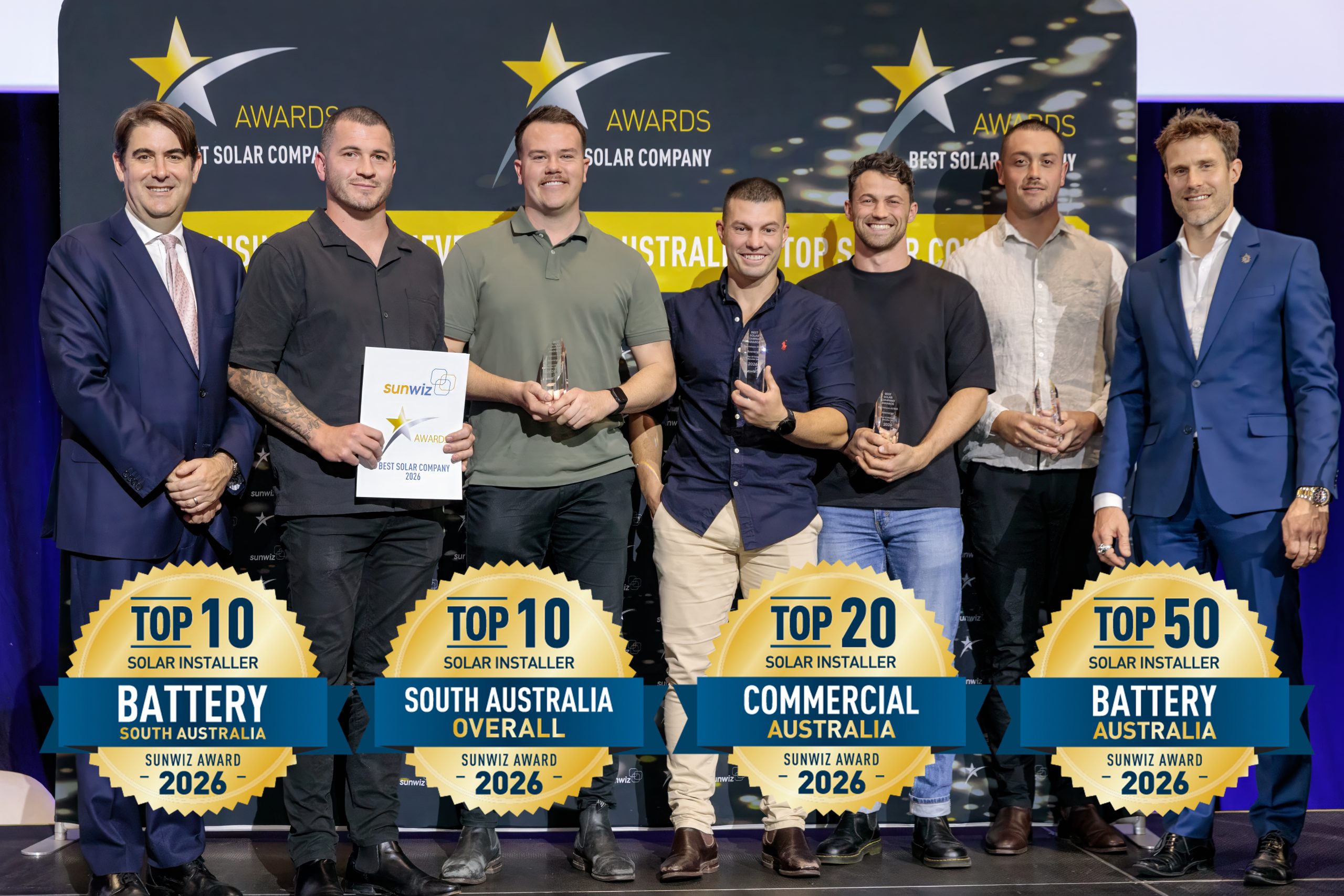 Arenergy accepting their 2026 SunWiz Award at the Smart Energy Conference, Sydney