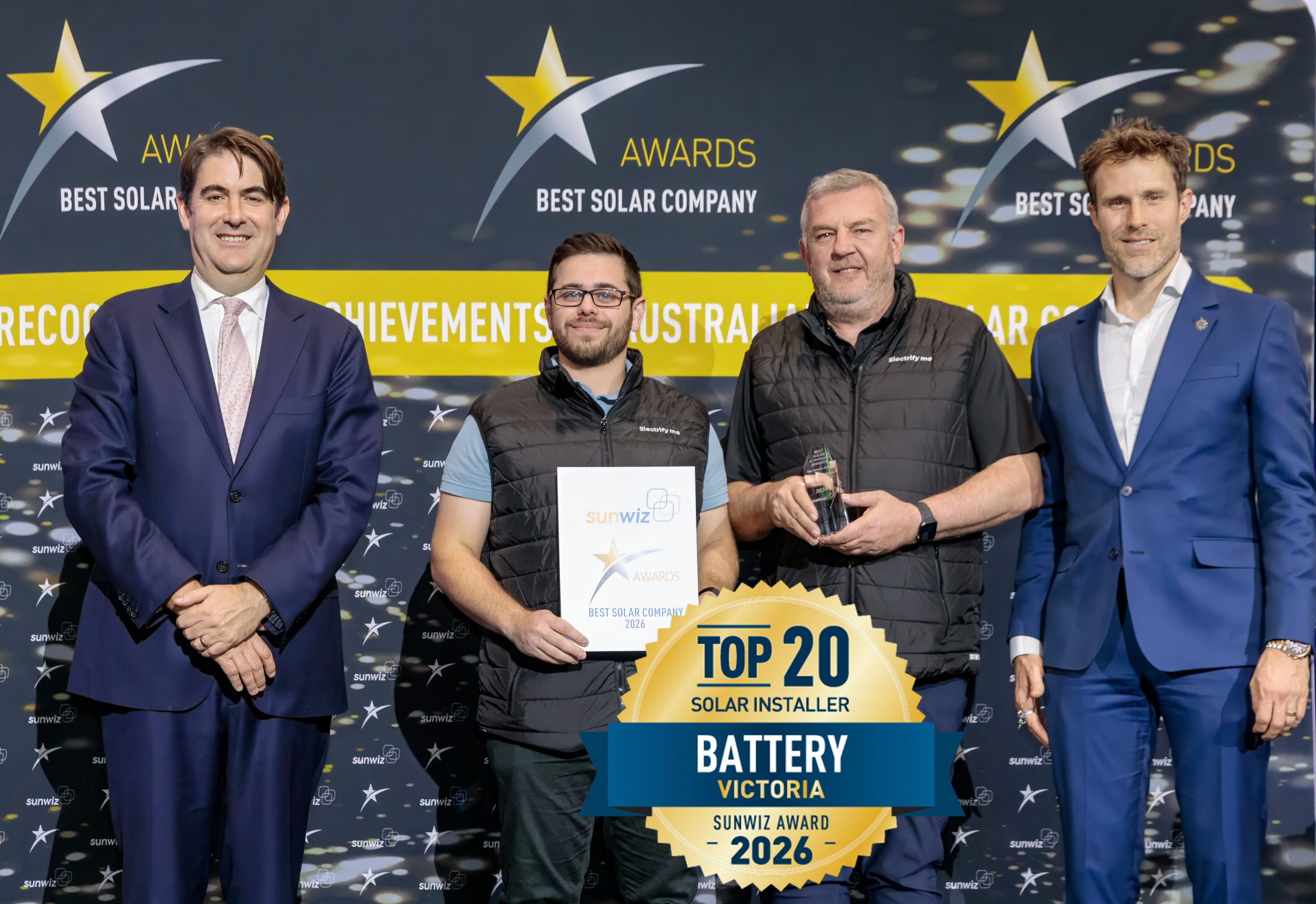 Electrify Me accepting their 2026 SunWiz Award at the Smart Energy Conference, Sydney