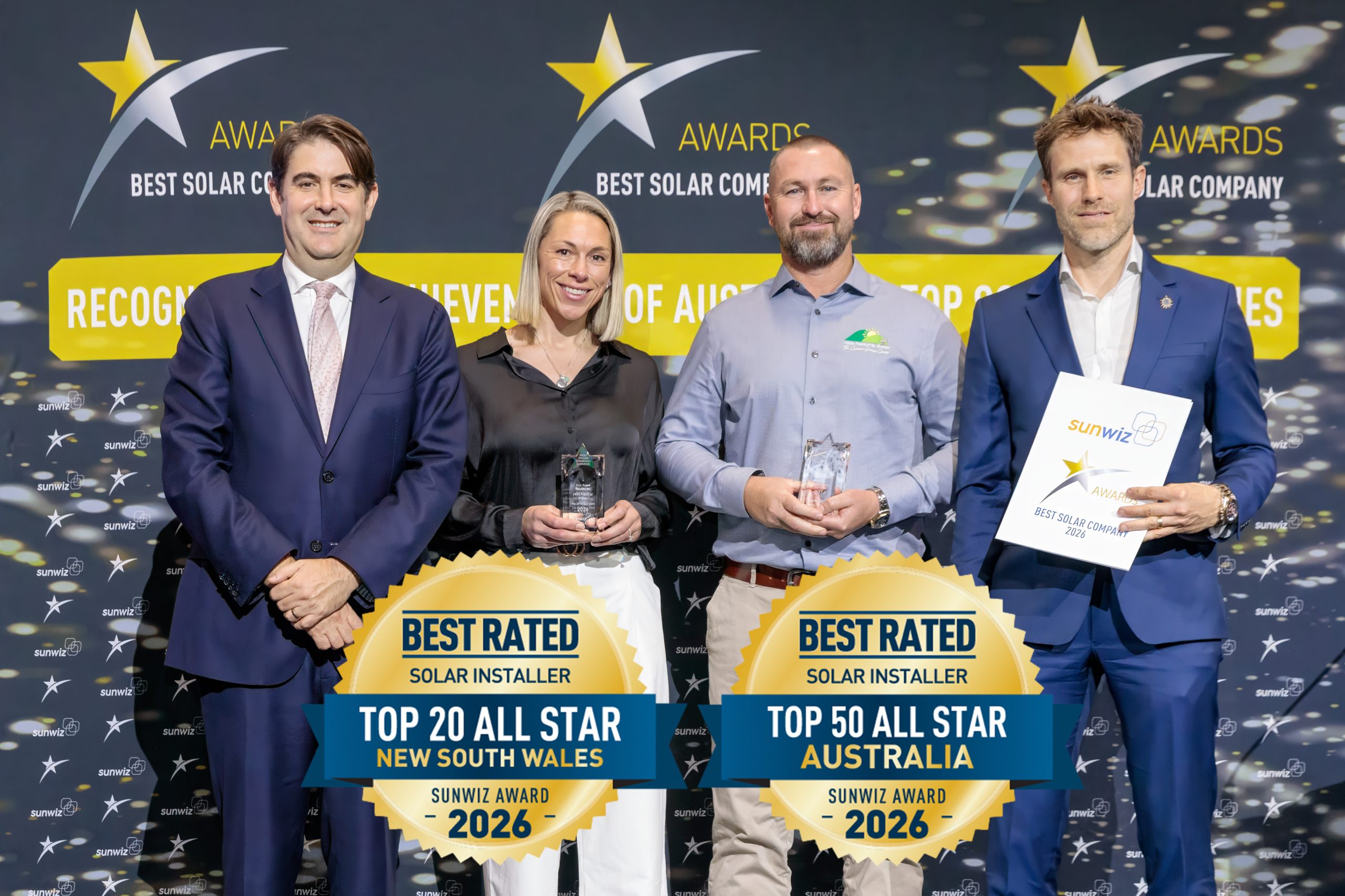 Hills Natural Solar accepting their 2026 SunWiz Award at the Smart Energy Conference, Sydney
