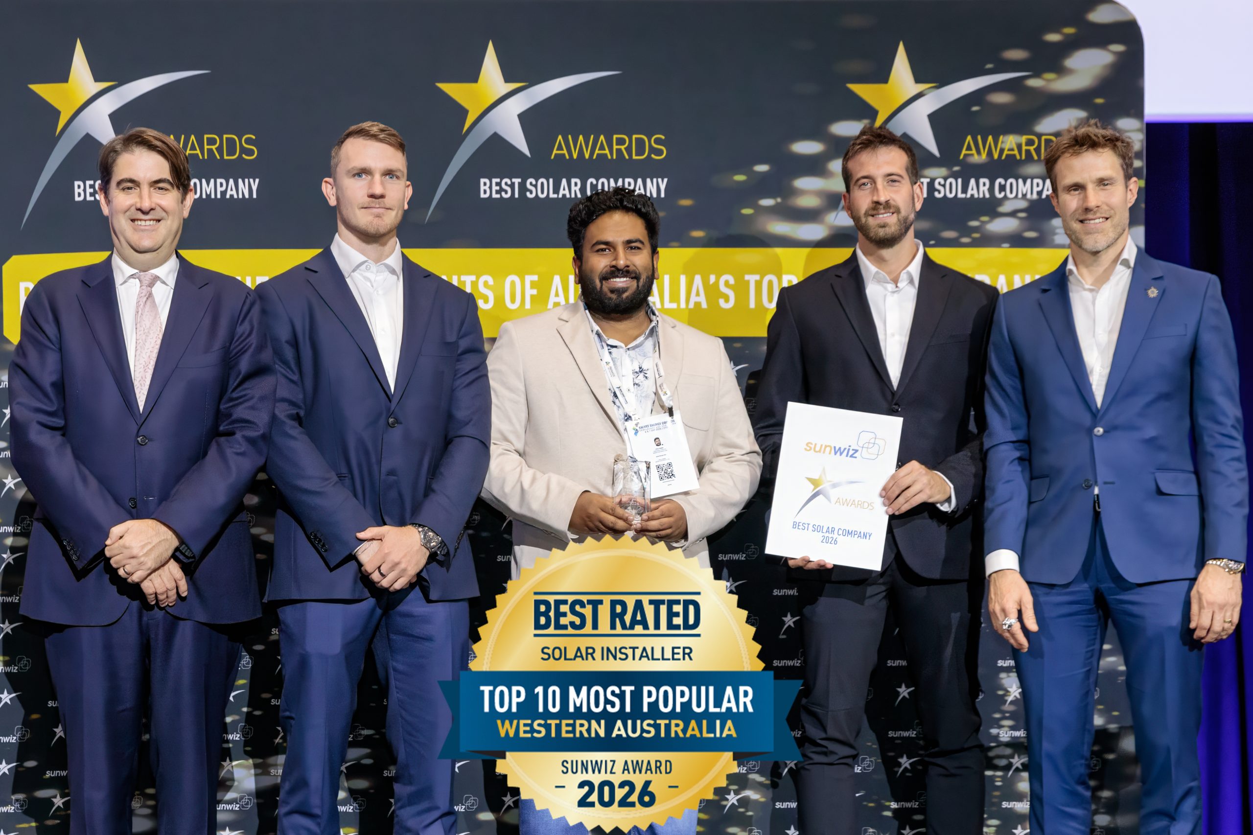 Solar 1 Nation Electricals accepting their 2026 SunWiz Award at the Smart Energy Conference, Sydney