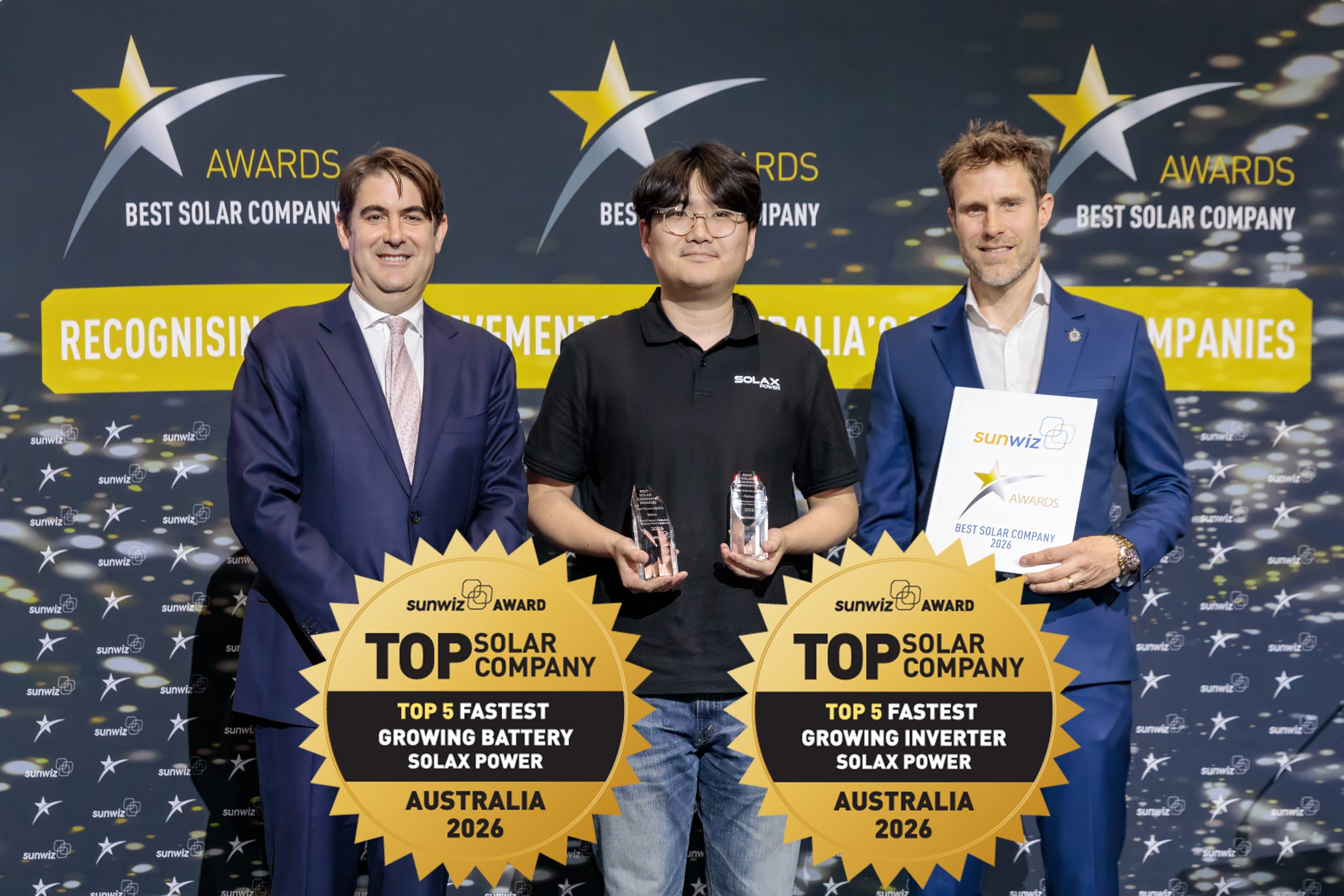 Solax accepting their 2026 SunWiz Award at the Smart Energy Conference, Sydney