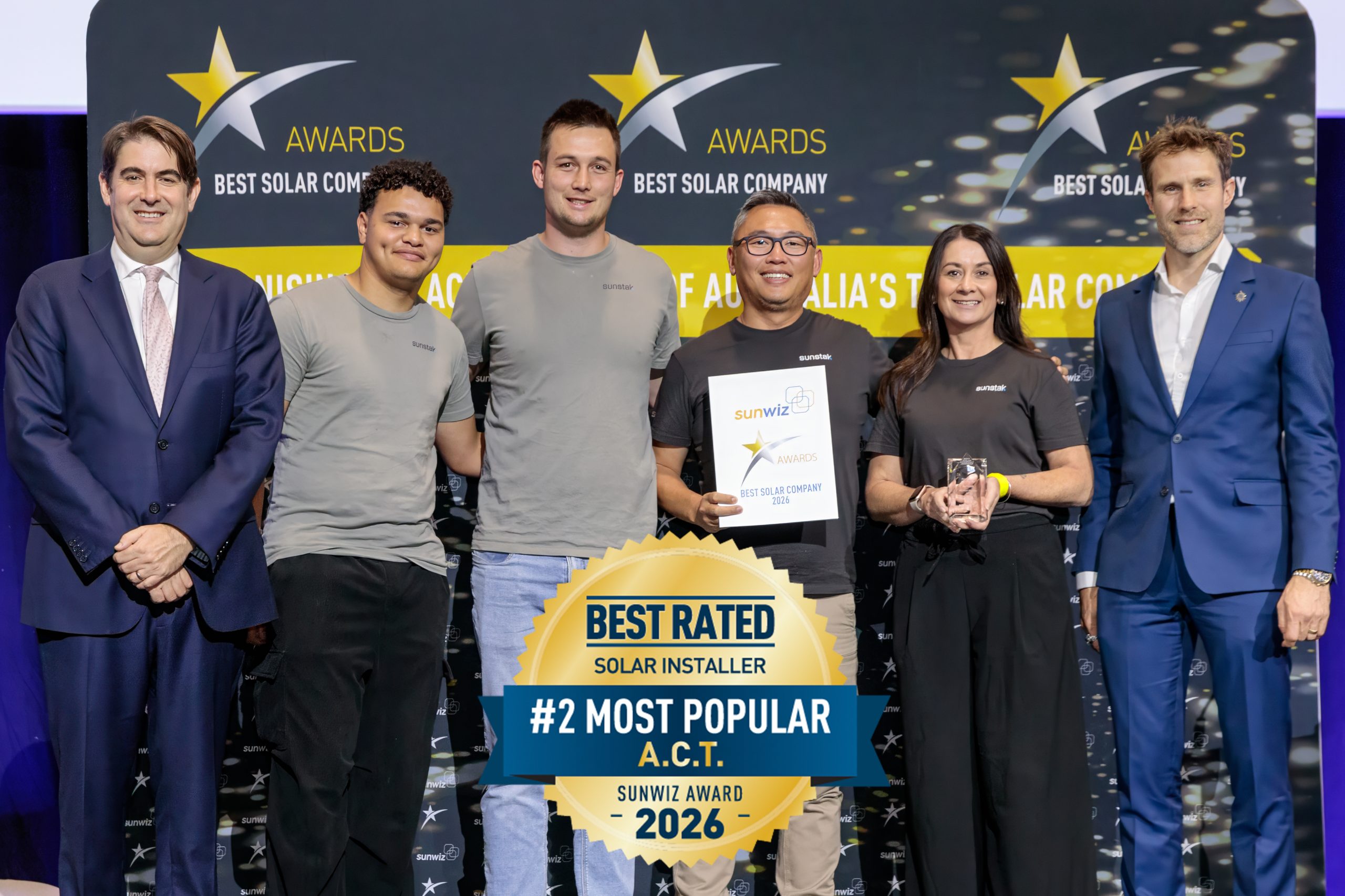Sunstak accepting their 2026 SunWiz Award at the Smart Energy Conference, Sydney
