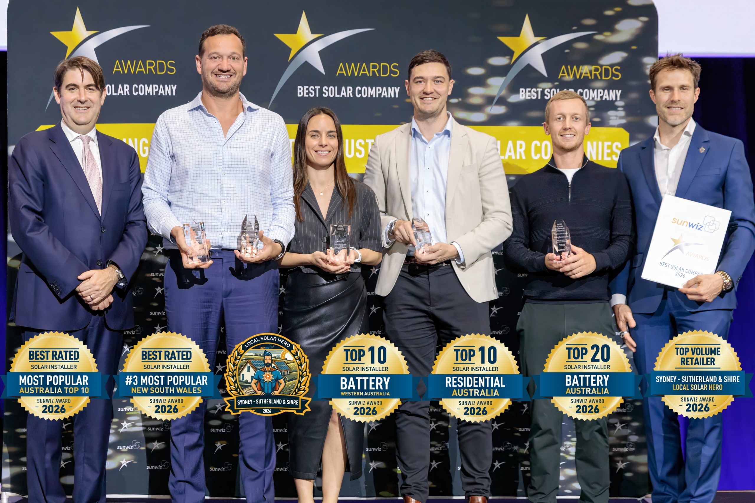 Think Renewable accepting their 2026 SunWiz Award at the Smart Energy Conference, Sydney
