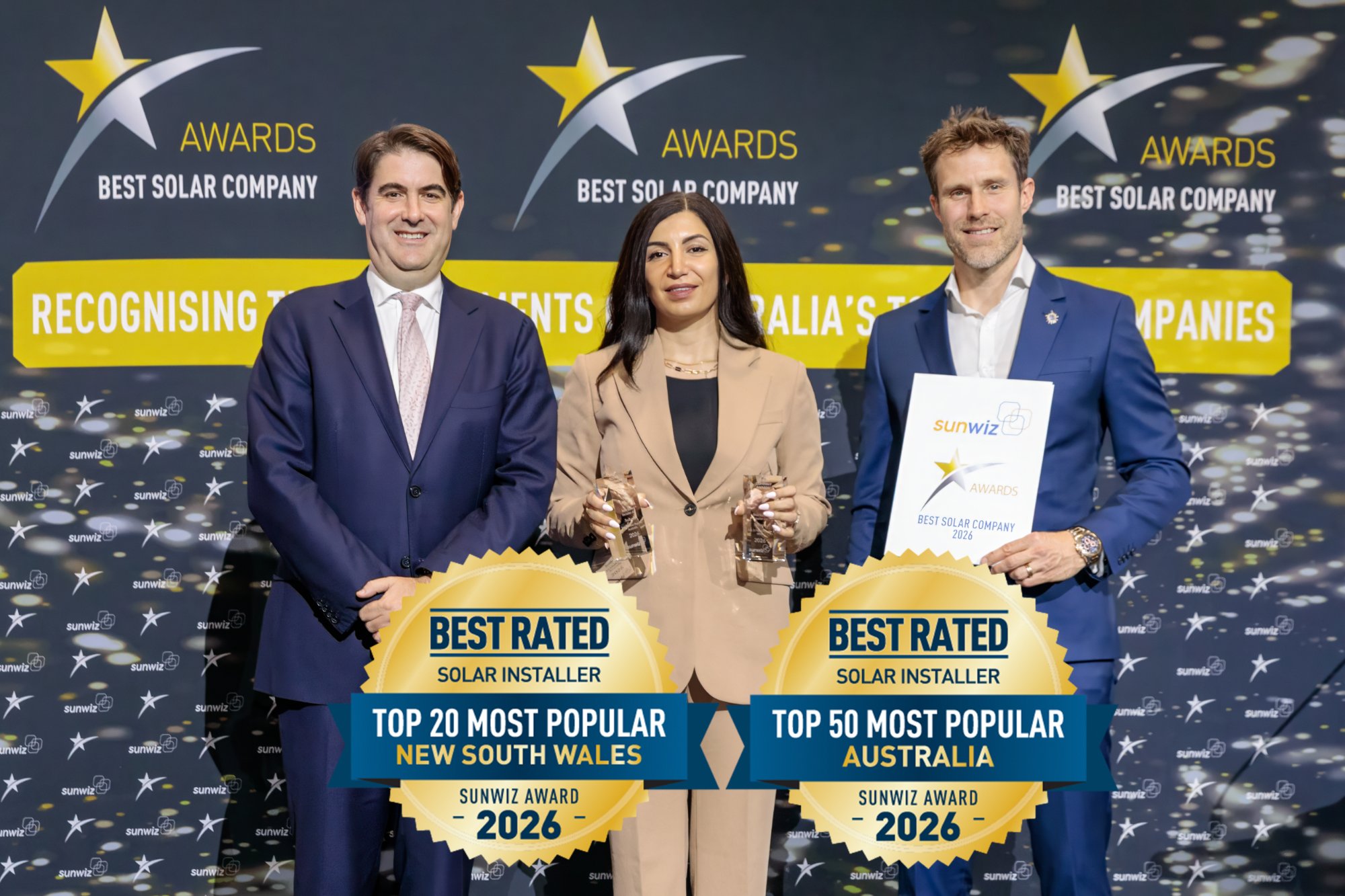 Solbase accepting their 2026 SunWiz Award at the Smart Energy Conference, Sydney